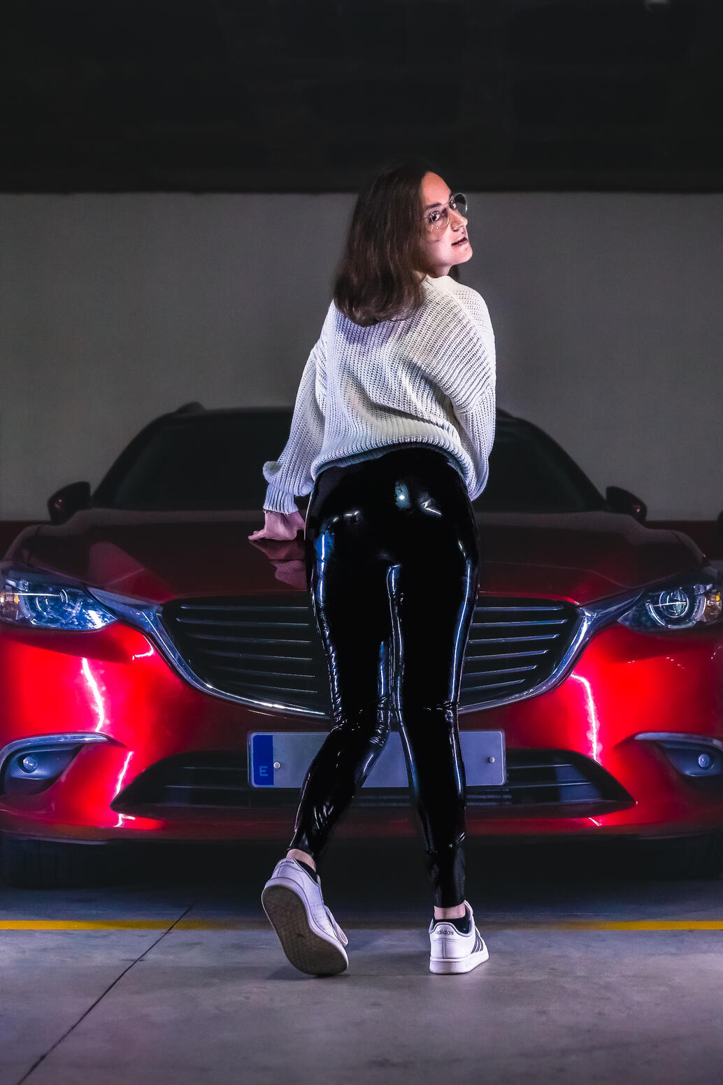 Red car with shiny leggings