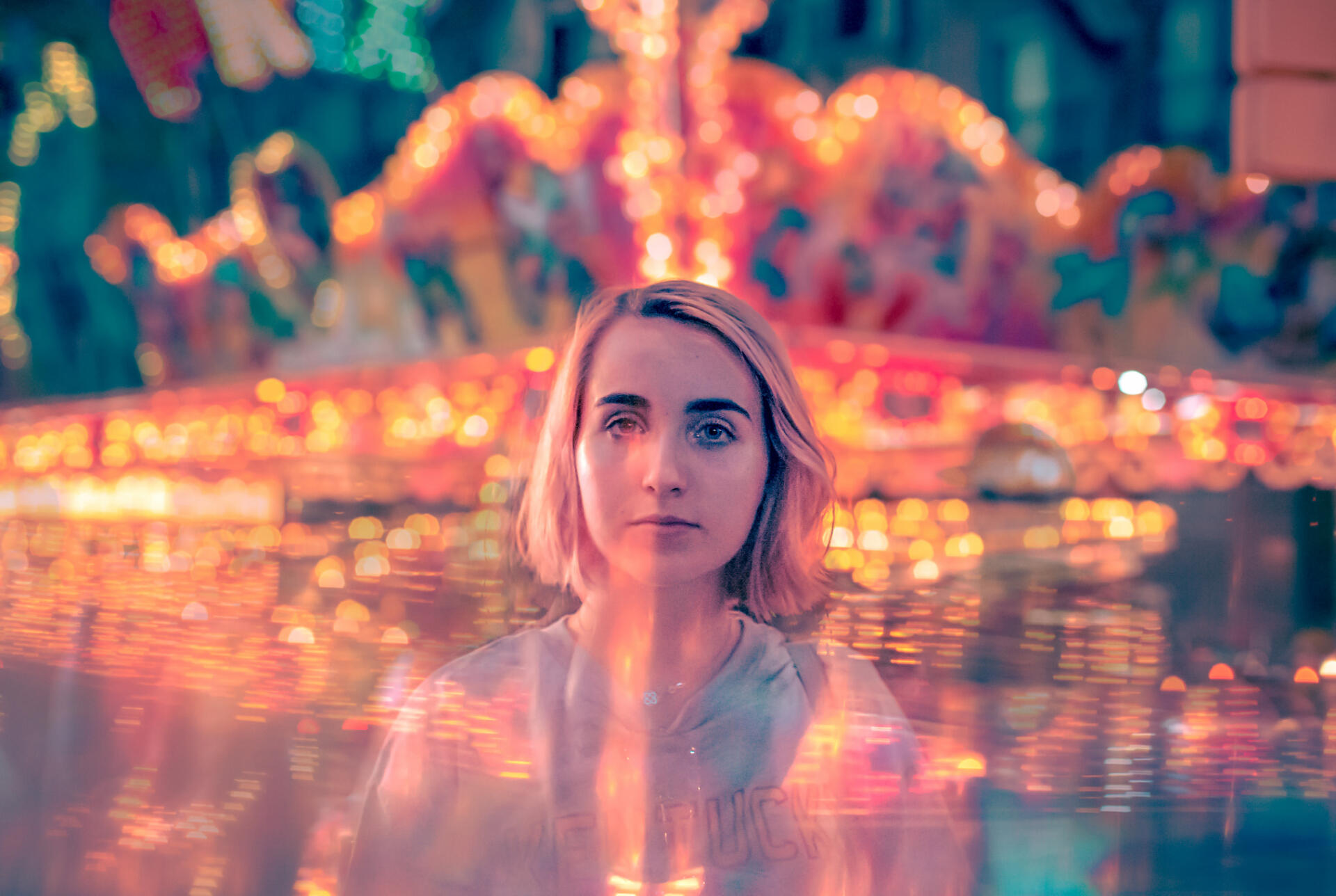 Cute girl drowning in carnaval lights